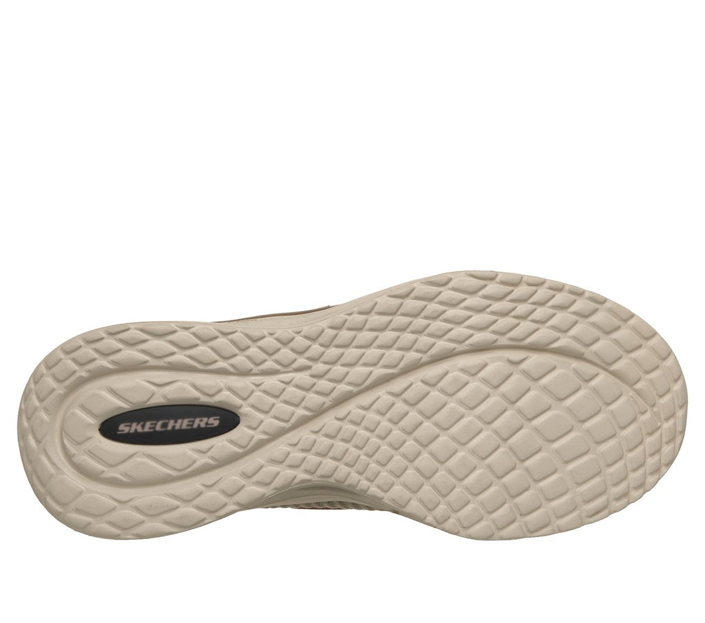 Bottom sole view of Skechers slip-in sneaker showing textured rubber outsole with diamond tread pattern