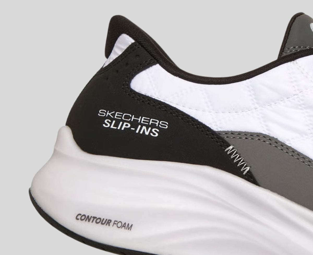 Close-up detail of Skechers Slip-ins heel with Contour Foam midsole branding visible