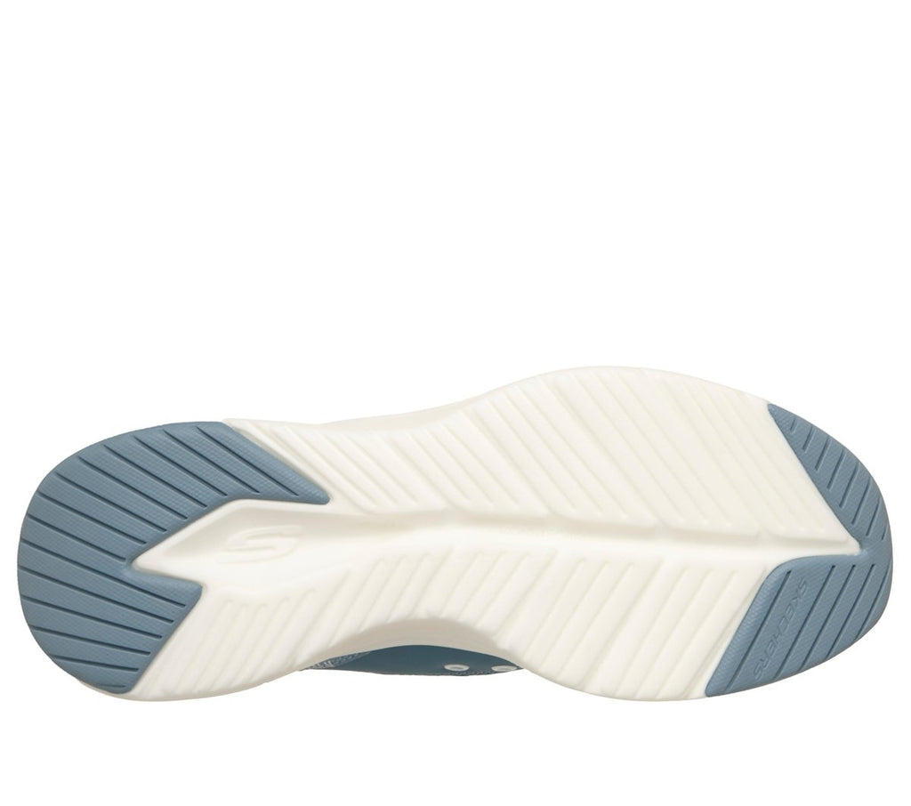 Bottom sole view of Skechers sneaker showing textured white and light blue outsole tread pattern