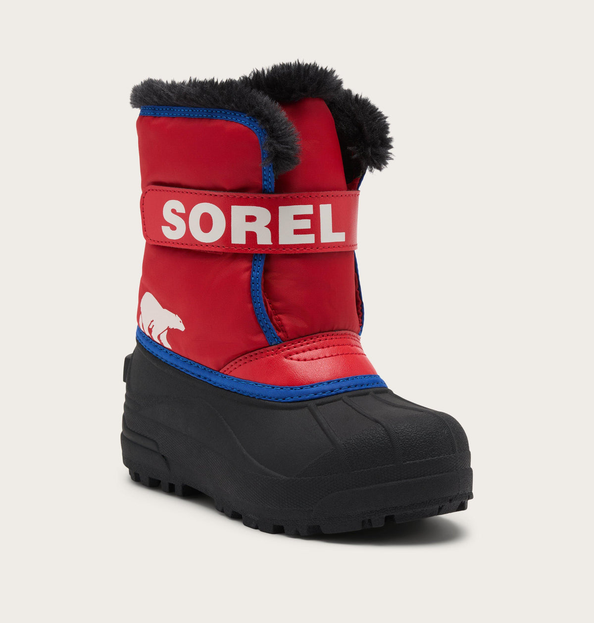 Kids Sorel Snow Commander winter boot with faux fur cuff and velcro strap