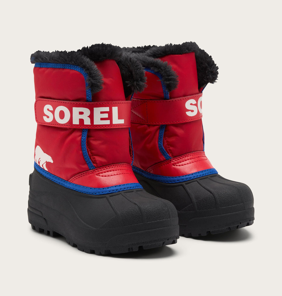 Sorel Kids Snow Commander winter boots with faux-fur collar and Velcro strap closure
