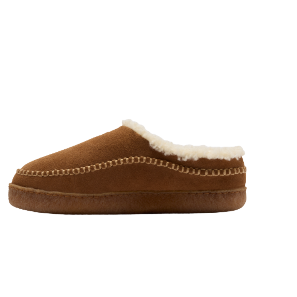 Men's slip-on moccasin slipper with shearling lining and whipstitch detail on rubber sole