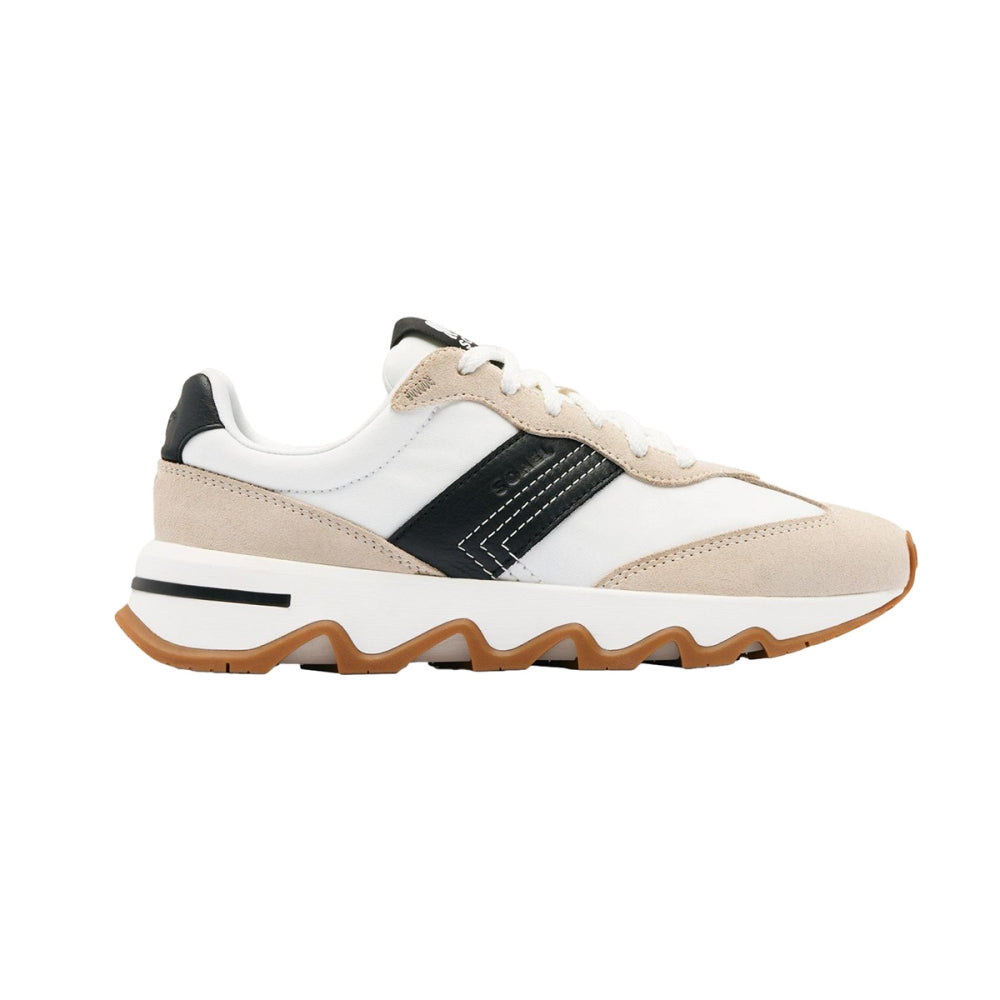 Sorel Kinetic Ember sneaker with beige suede, white leather panels, black stripe, and wavy gum sole