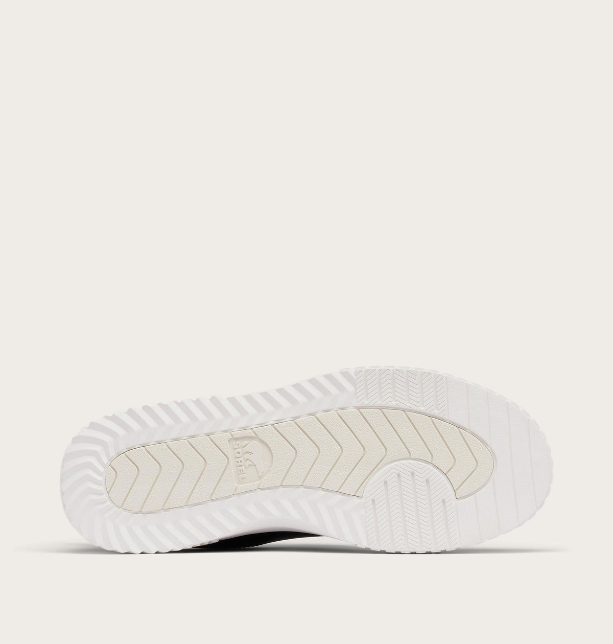 Bottom sole view of Sorel sneaker showing chevron tread pattern and brand logo