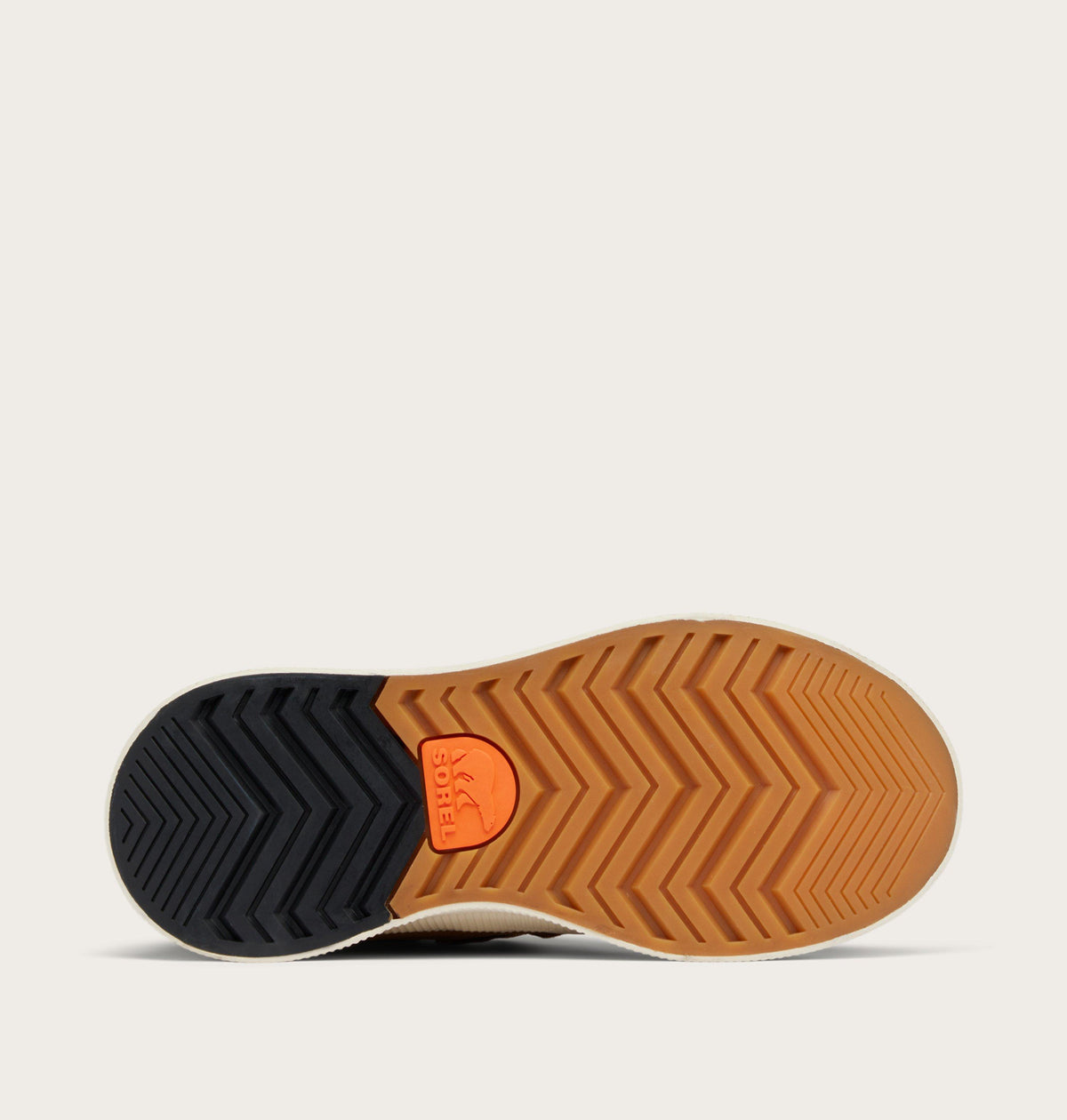 Bottom view of Sorel sneaker outsole showing chevron tread pattern with dual-tone rubber