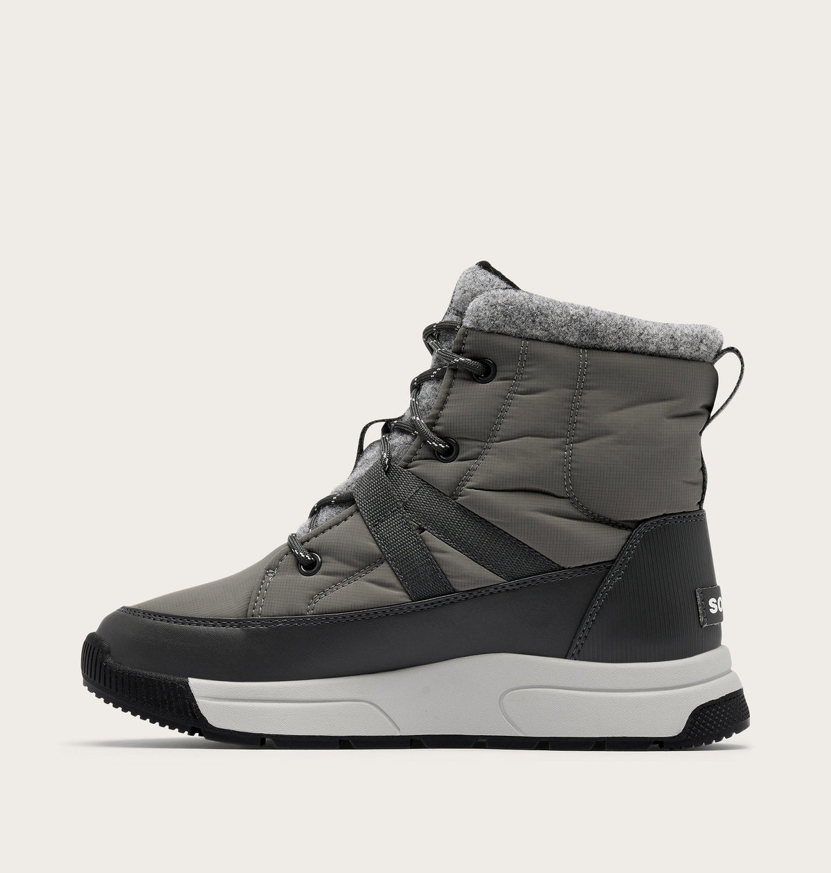 Sorel women's mid-height lace-up winter boot with quilted upper and grey fleece cuff