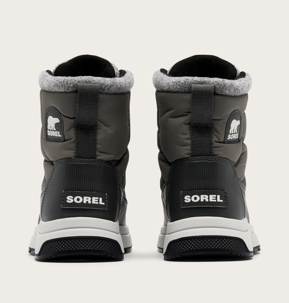 Sorel Whitney III Mid WP winter boots shown from the back as a pair