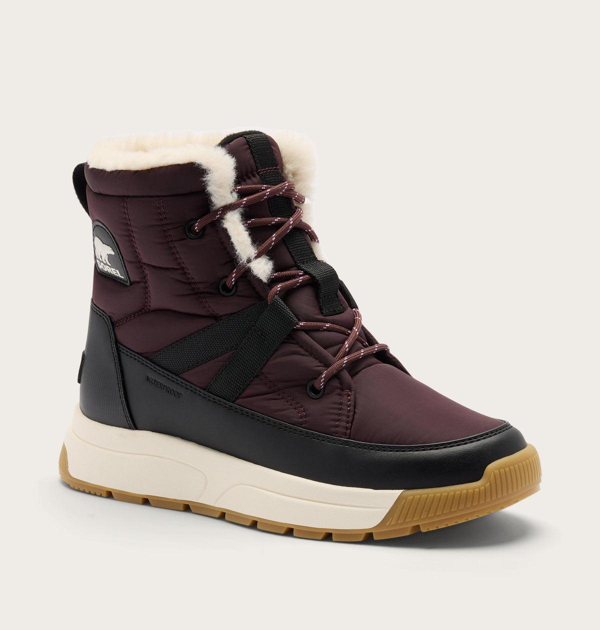 Sorel women's waterproof winter boot with shearling collar and chunky white sole