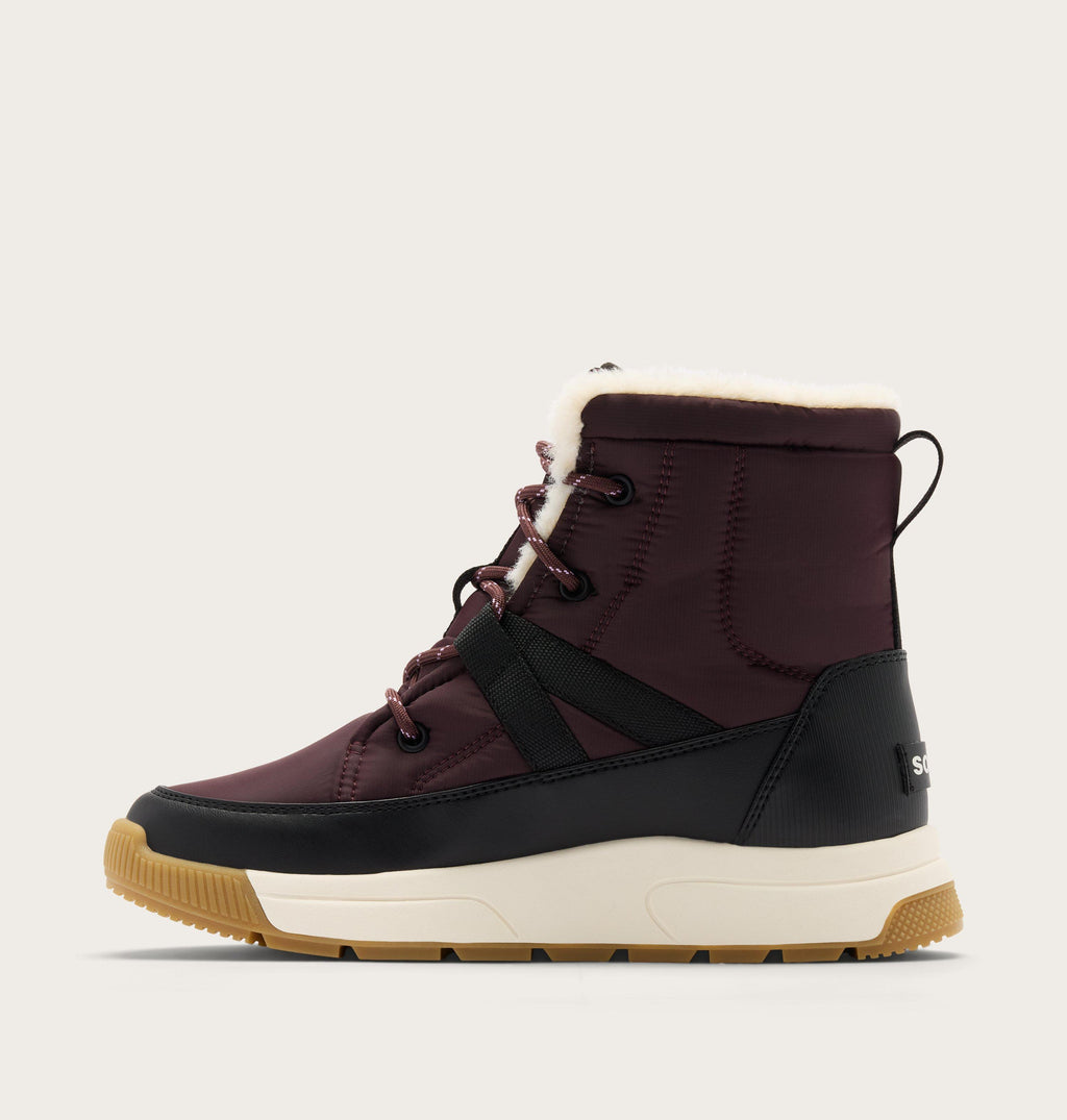 Women's lace-up winter boot with sherpa collar, quilted upper, and gum rubber outsole