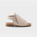 Women's leather sandal with ruched toe box, side zipper closure, and slingback strap