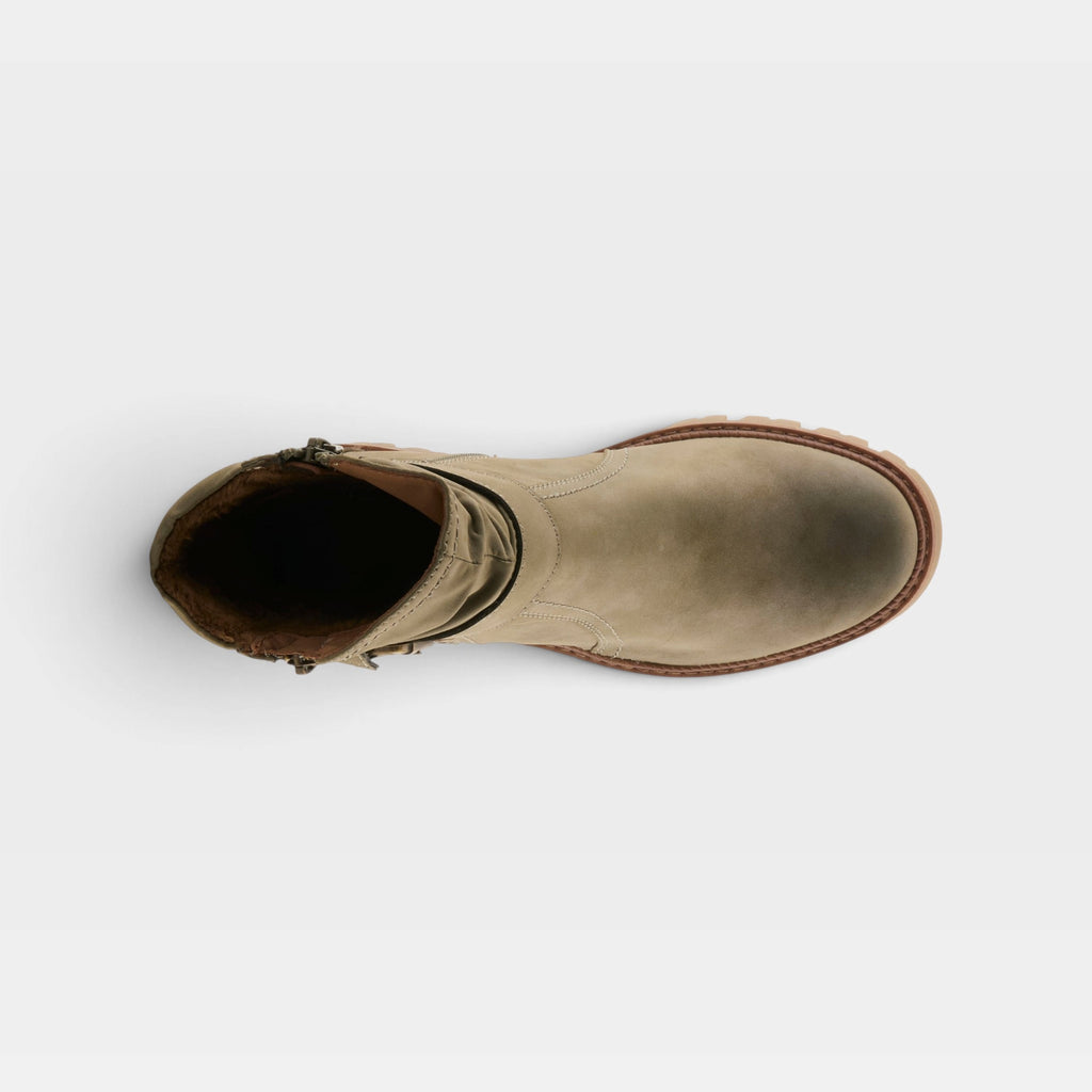 Top-down view of a women's ankle boot with side zipper and chunky sole