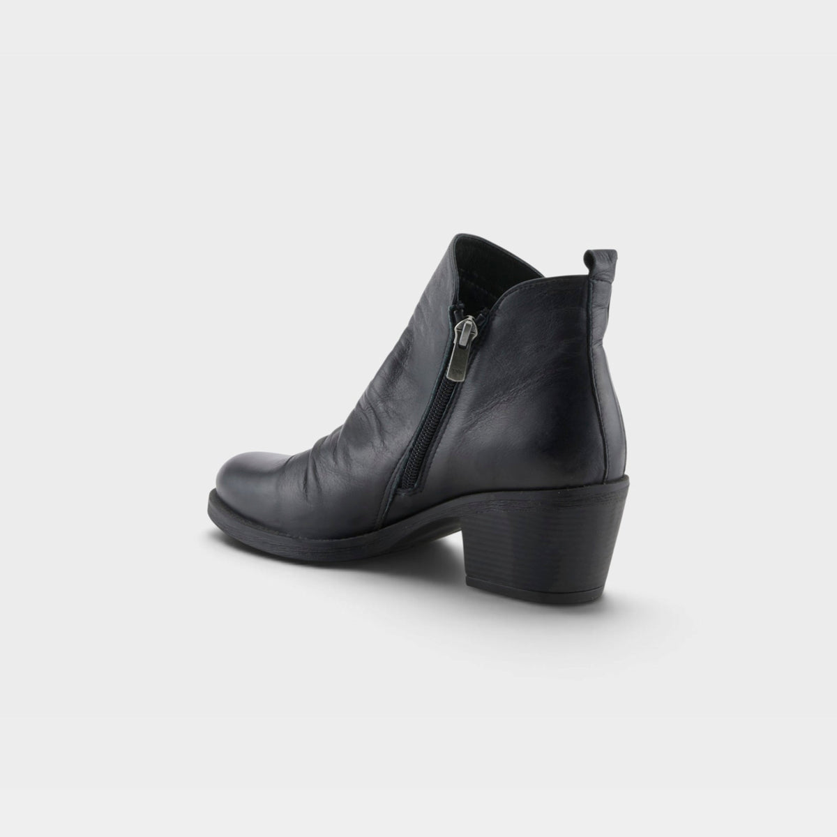 Back view of a black leather ankle boot with side zipper and block heel
