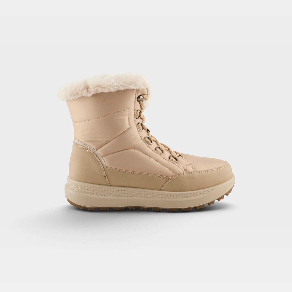 Women's lace-up winter boot with faux fur cuff and chunky rubber sole, side view