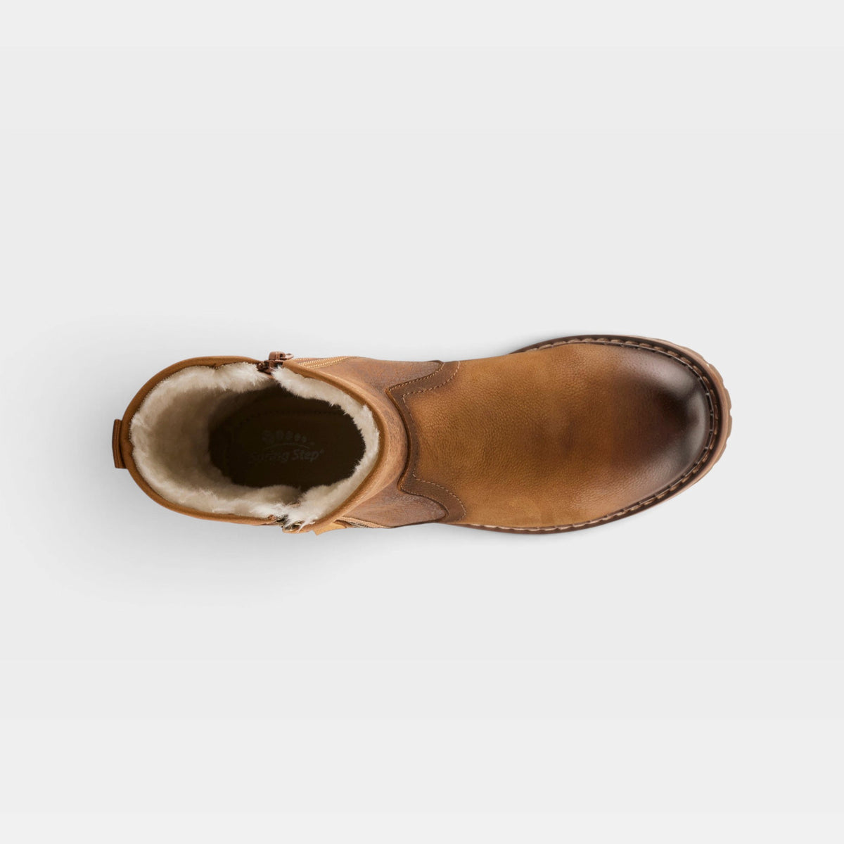 Top-down view of a shearling-lined leather ankle boot with side zipper closure