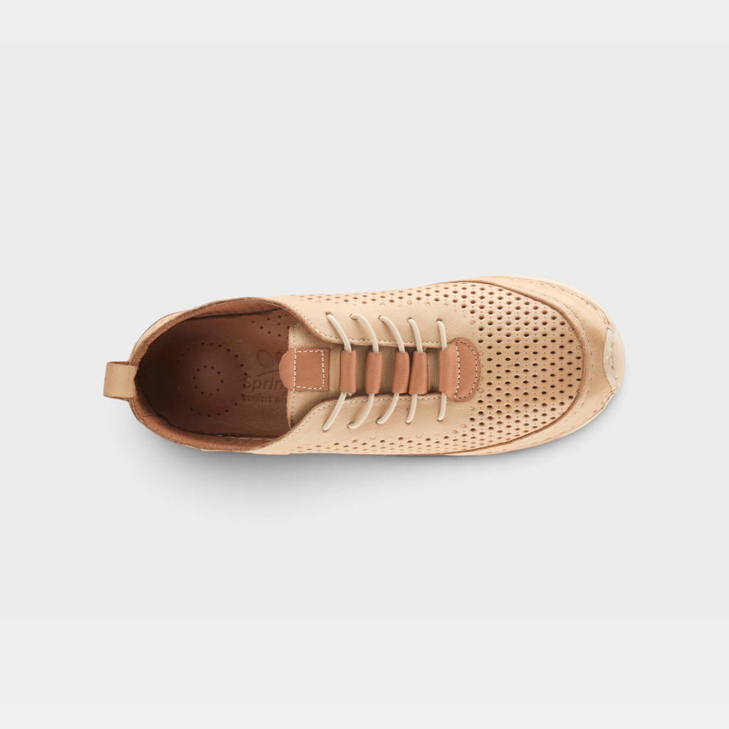 Top-down view of a perforated beige leather lace-up sneaker with tan accent details