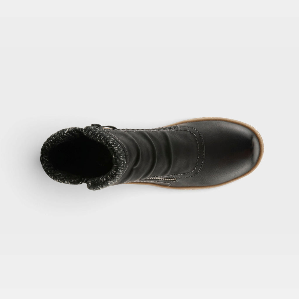 Top-down view of a black leather ankle boot with knit collar trim and side zipper