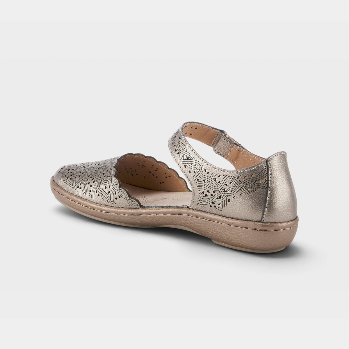 Back view of women's flat shoe with laser-cut floral perforations and ankle strap closure