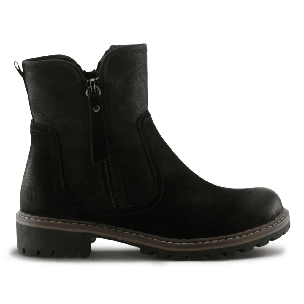 Women's ankle boot with side zipper closure, lugged sole, and mixed texture upper