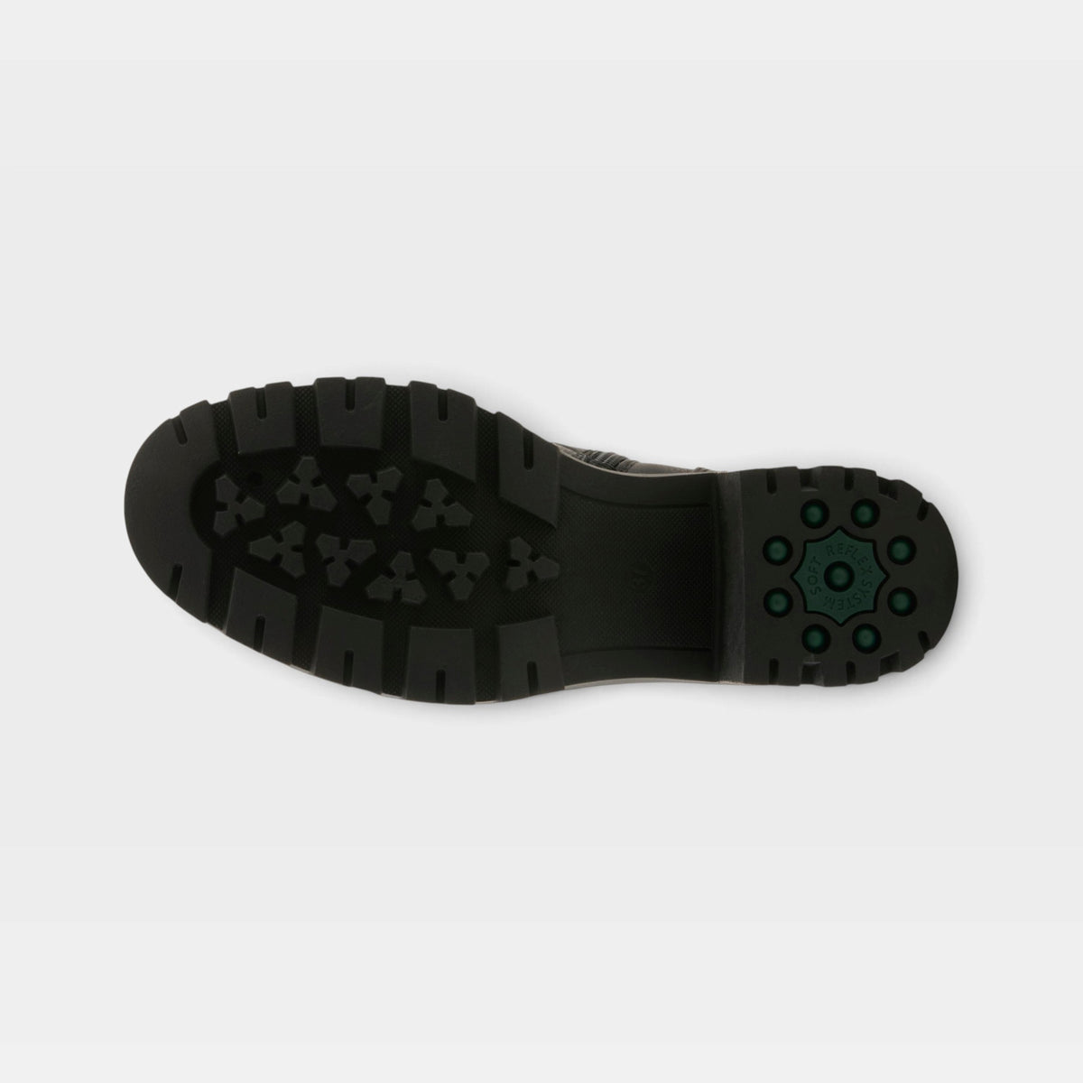 Bottom sole view of a chunky black lug-sole boot with green rubber heel accents