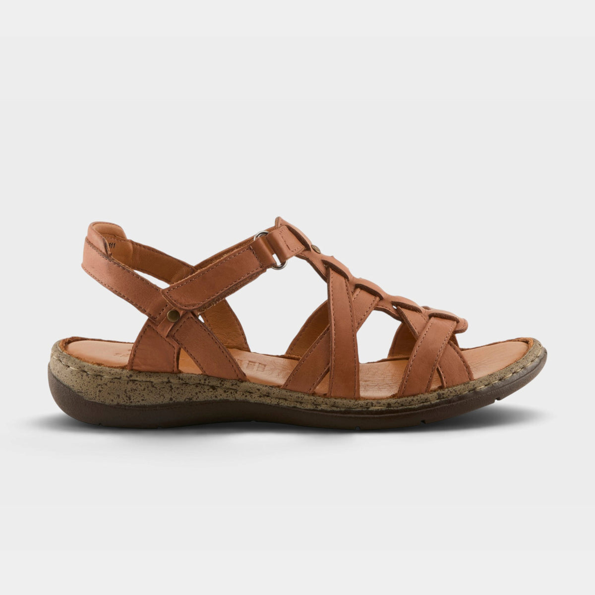 Women's strappy leather sandal with woven toe cage and adjustable slingback ankle strap