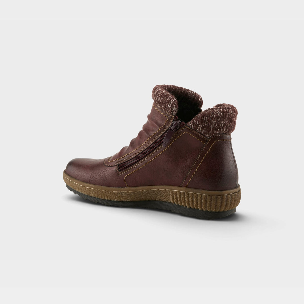 Women's ankle boot with knit collar trim, side zipper, and textured rubber sole, rear angled view
