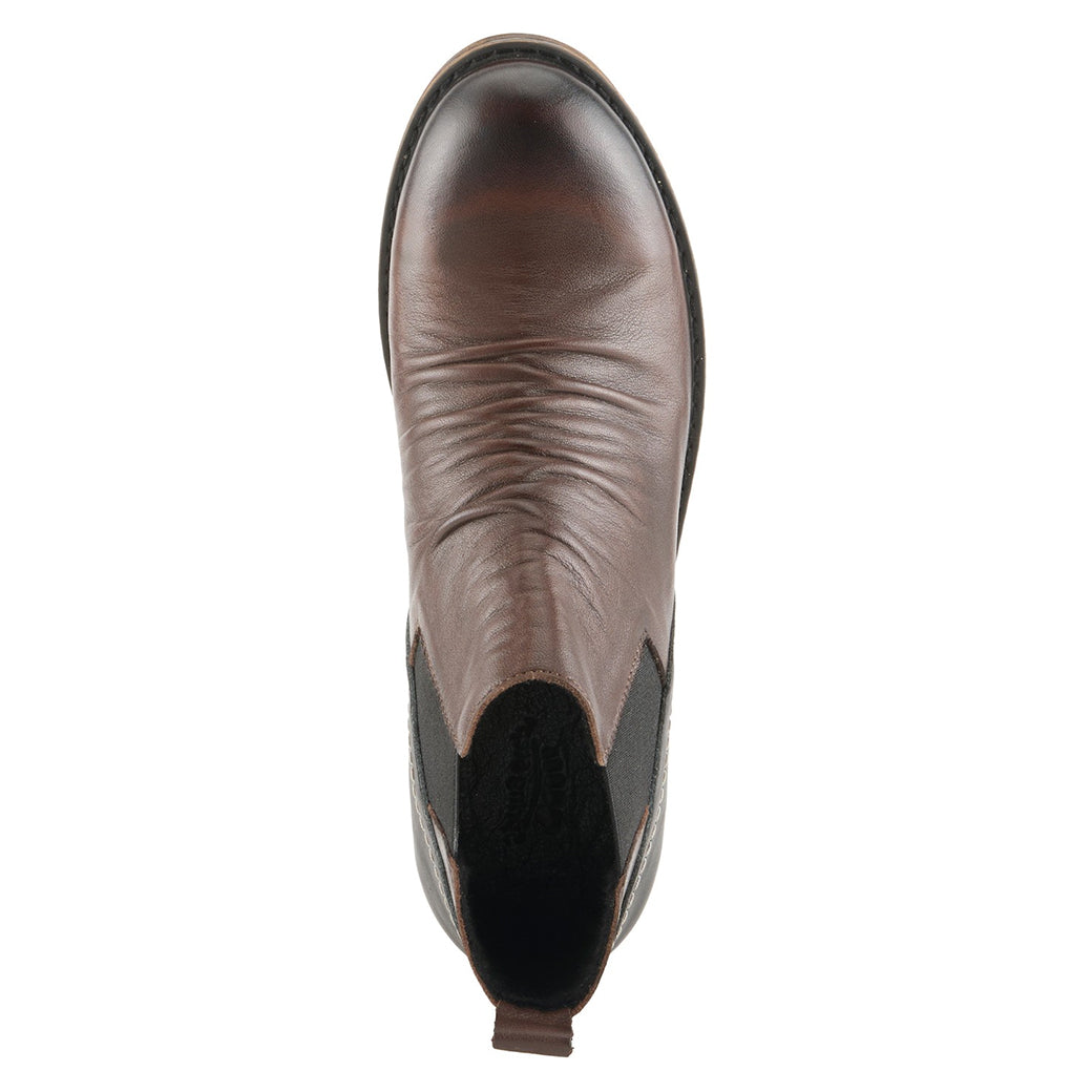Top-down view of a brown leather Chelsea ankle boot with elastic side panel