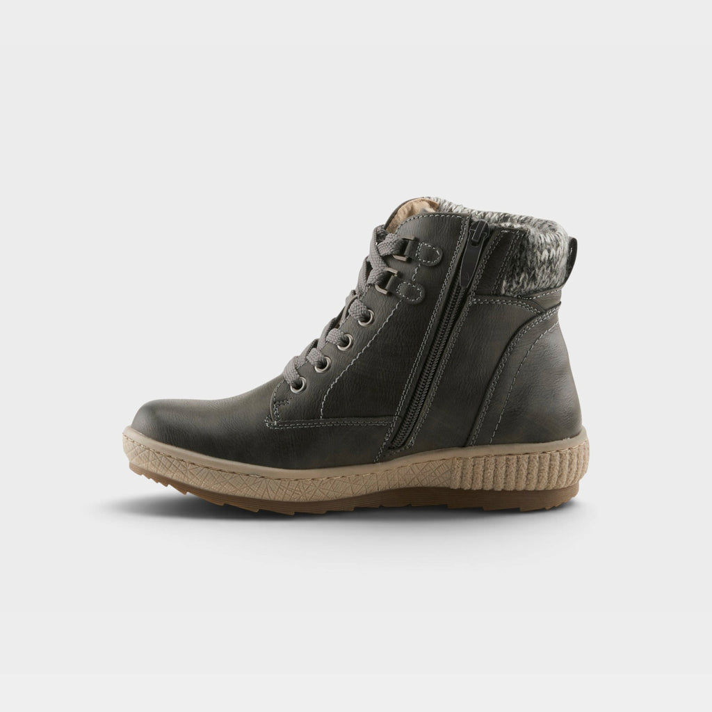 Women's ankle boot with lace-up front, side zipper, faux fur collar, and textured sole