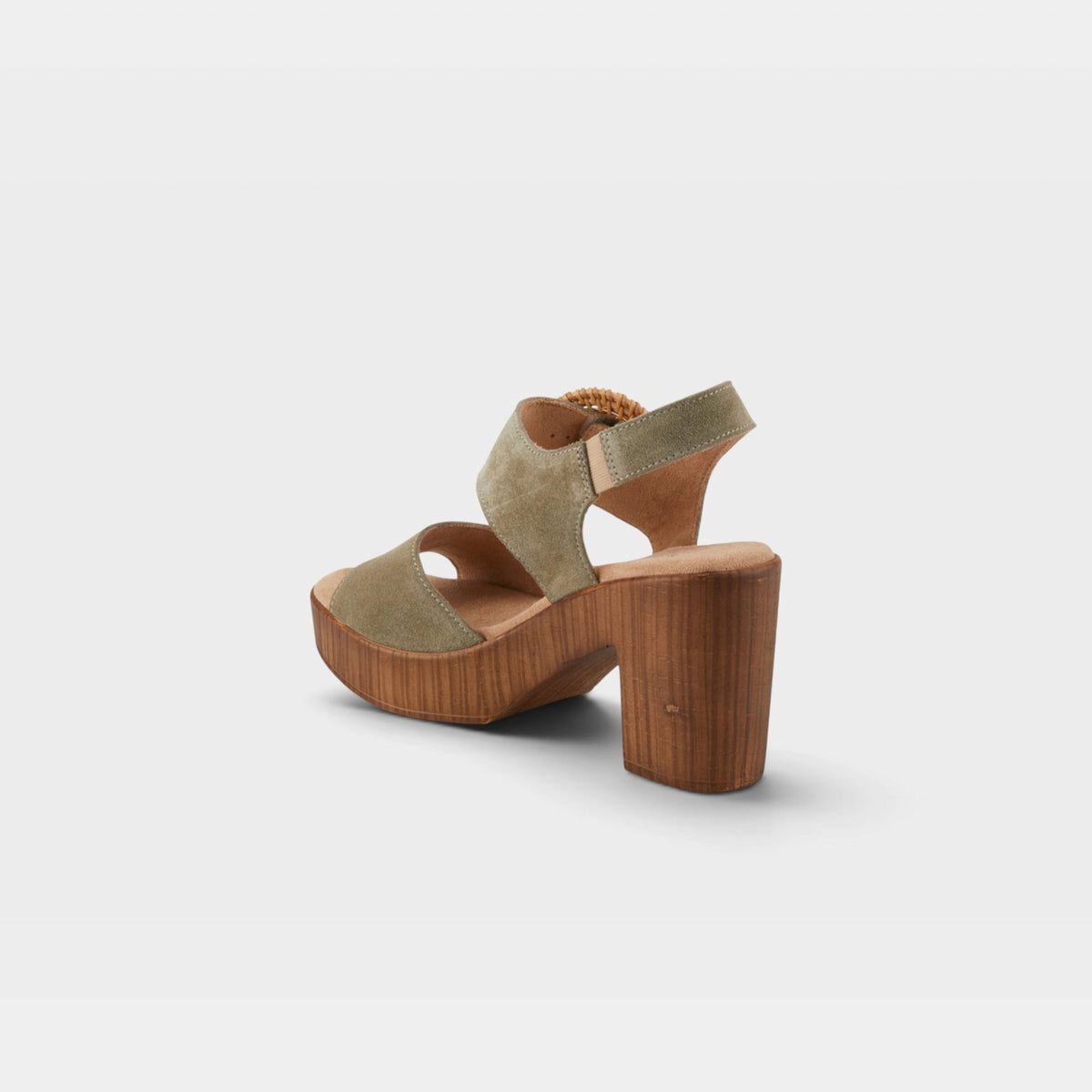 Back view of women's platform block heel sandal with ankle strap and suede upper
