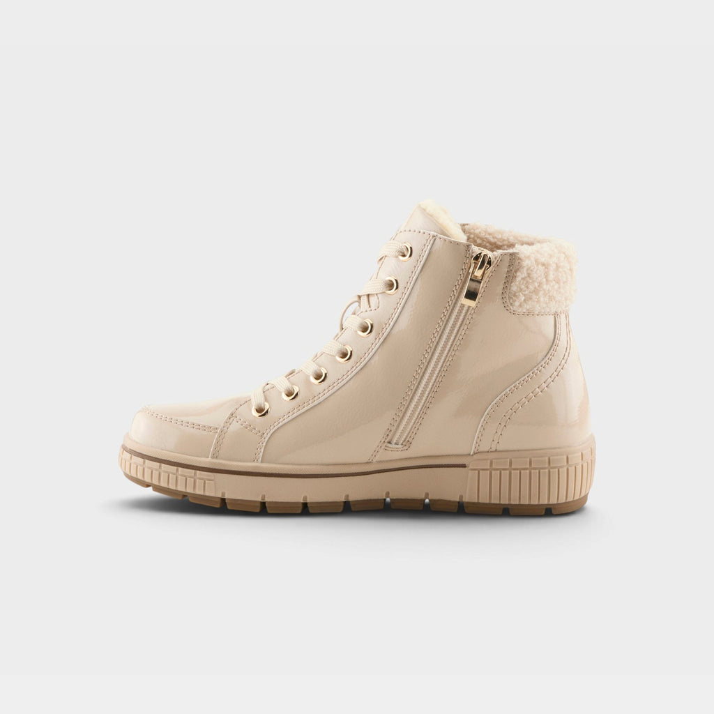 Women's high-top ankle boot with patent finish, lace-up front, gold zipper, and sherpa collar
