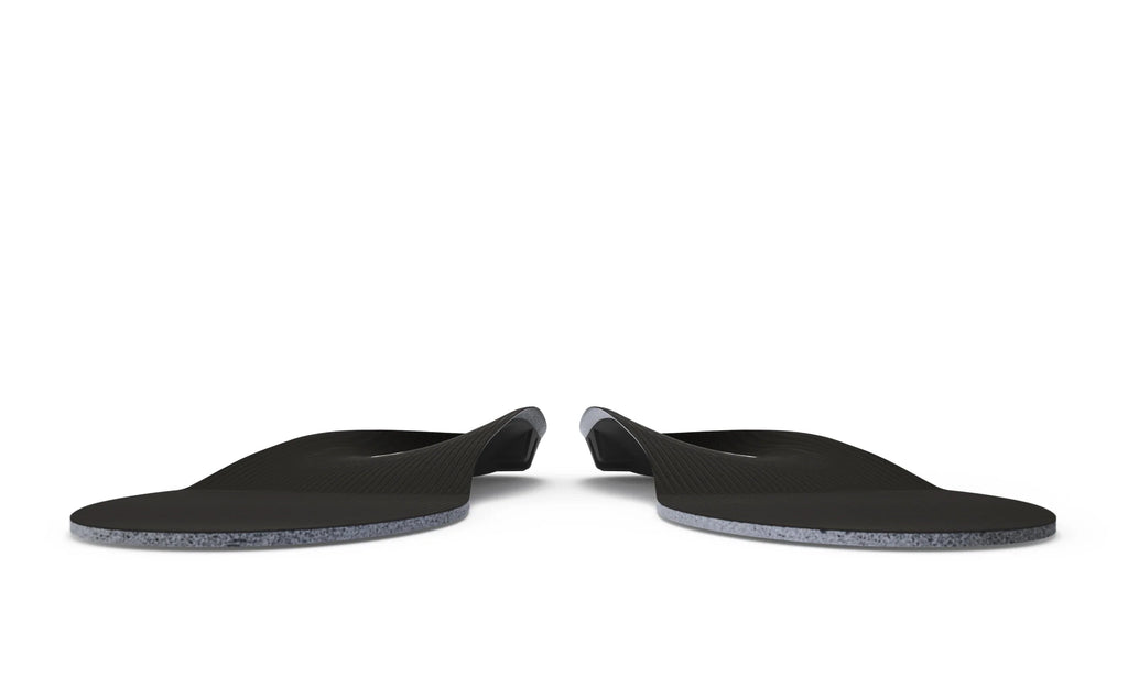 Pair of black orthotic insoles shown side by side on white background, arch support visible