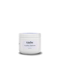 Taos Leather Balsam in a white 4-ounce jar with lavender label