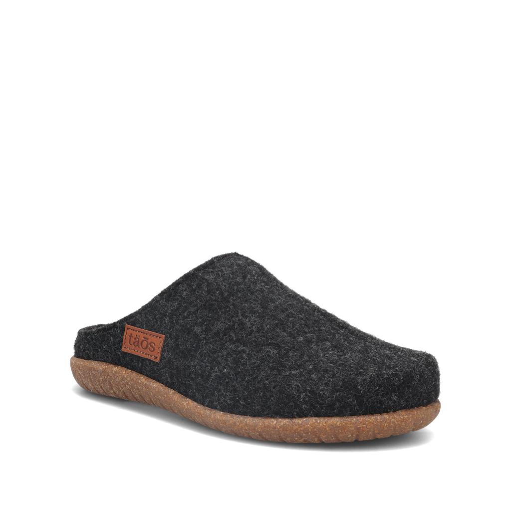 Taos Woolness felt clog slipper with cork sole and leather brand label, angled side view