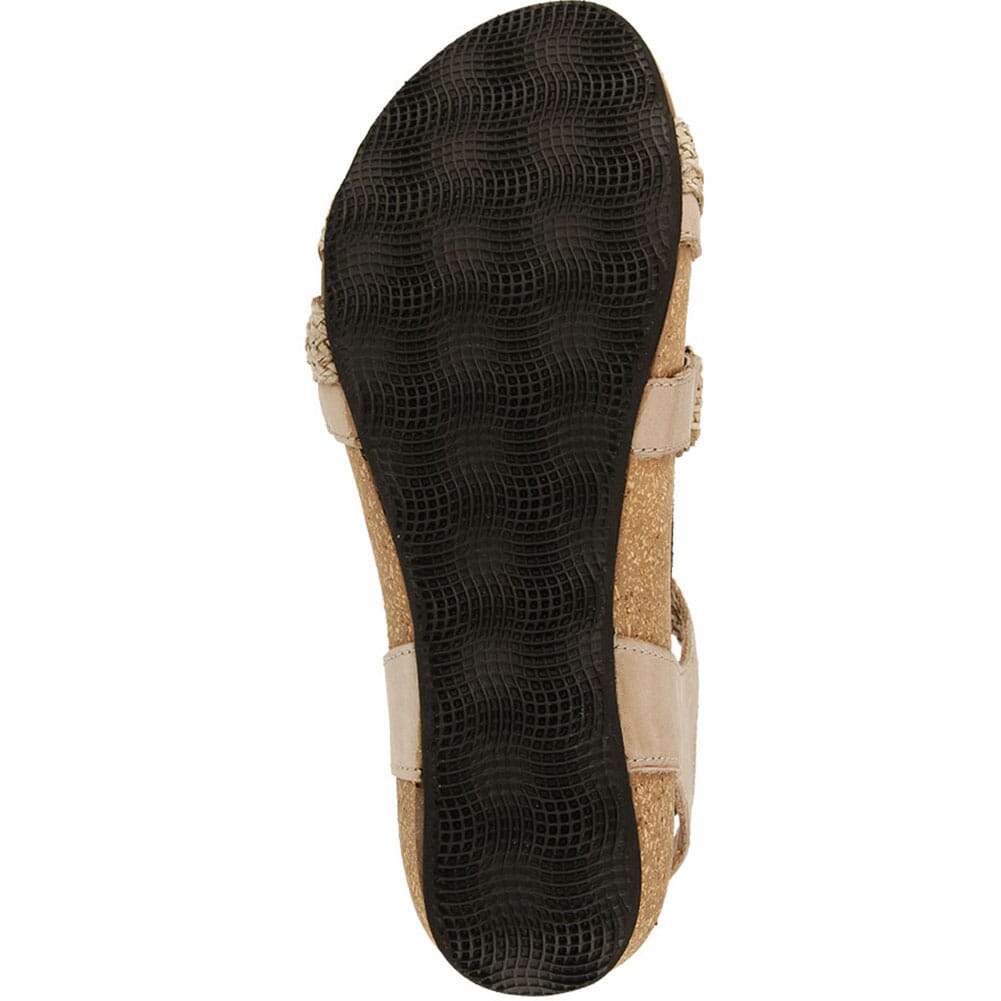 Bottom sole view of a womens strappy sandal with textured rubber outsole and cork wedge