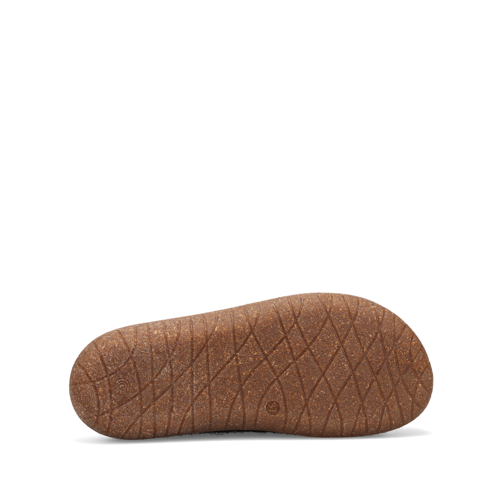 Bottom sole view of a Taos Woolness shoe showing textured rubber outsole with diamond tread pattern