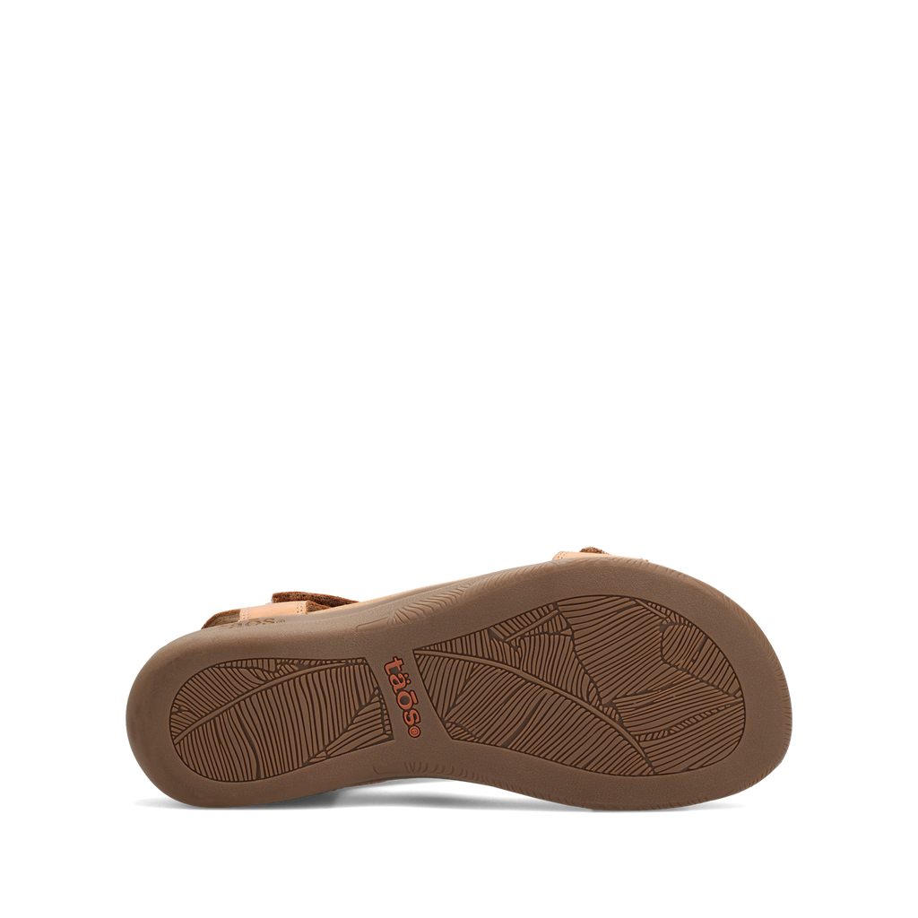 Bottom sole view of Taos sandal showing leaf-patterned outsole with brand logo