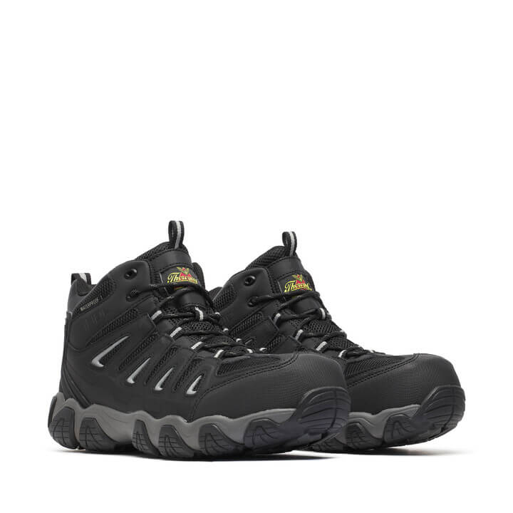 Thorogood men's mid-height waterproof safety toe work boots with lace-up closure and rugged outsole