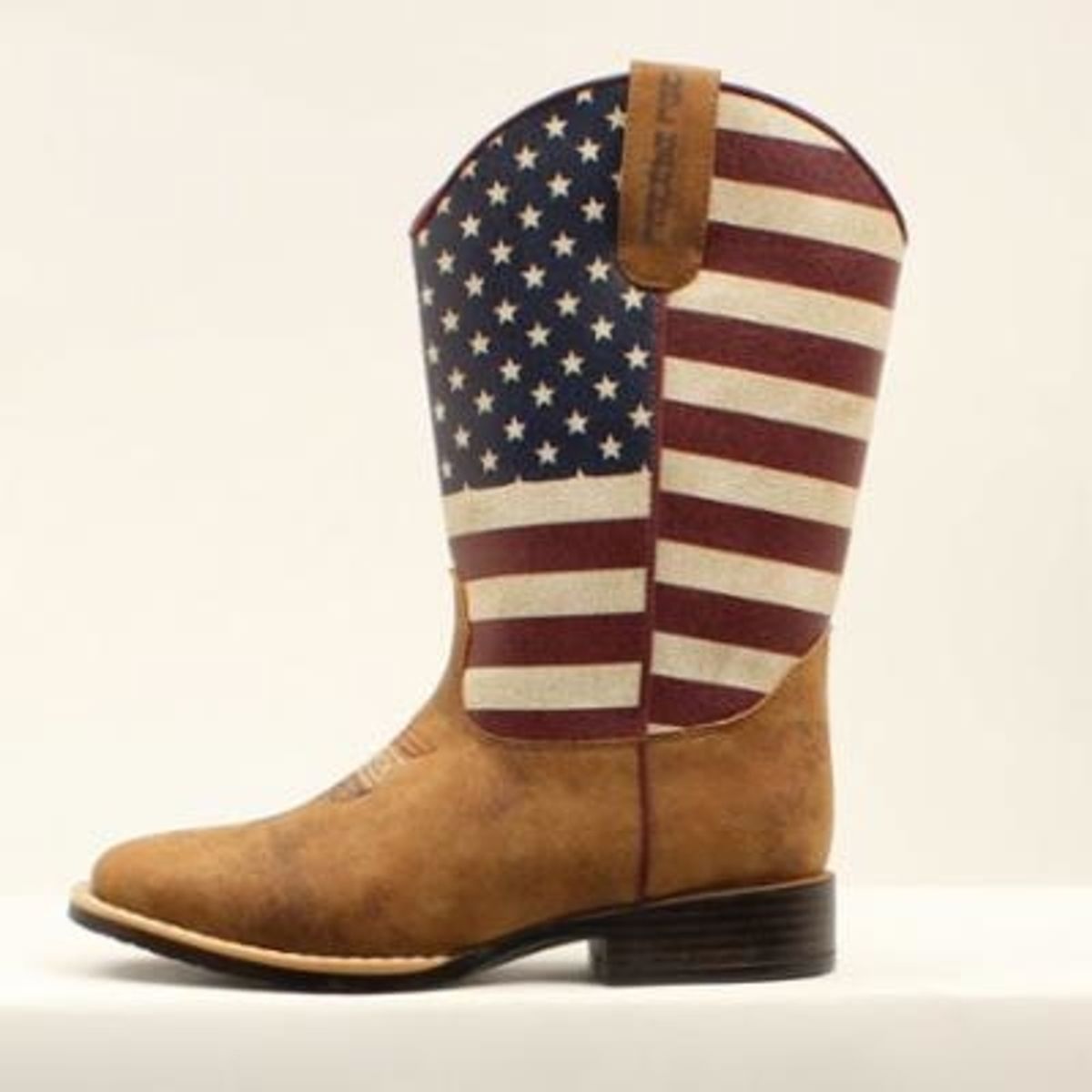 Kids western pull-on boot with American flag shaft and tan leather foot